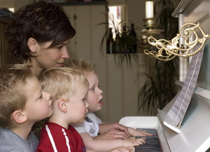 Family playing piano