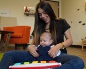 Baby and mom in music class