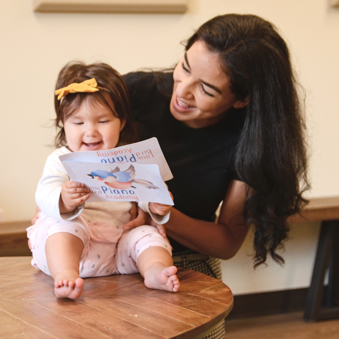 mom teaching baby music