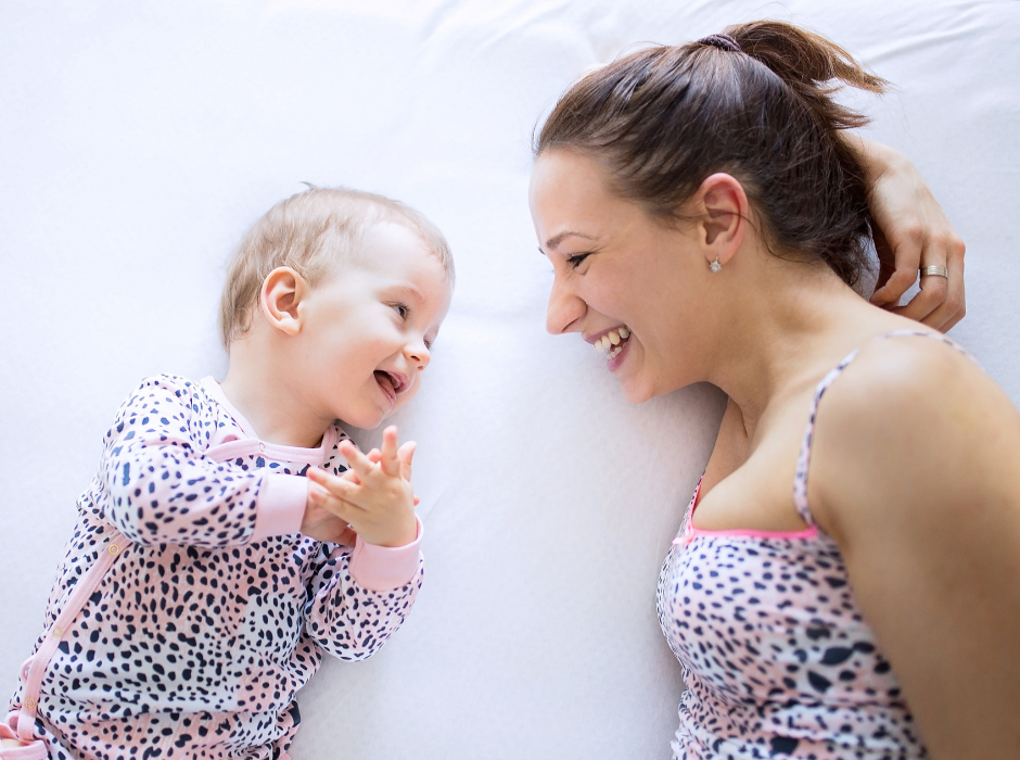 baby and mom singing together