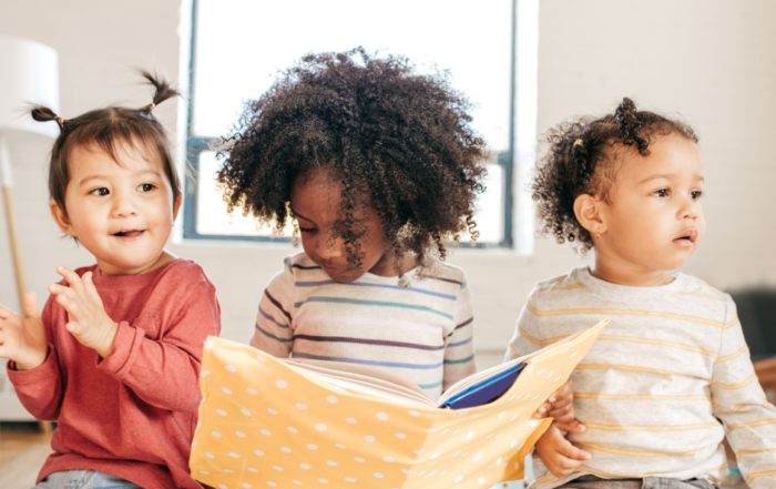 toddlers reading together