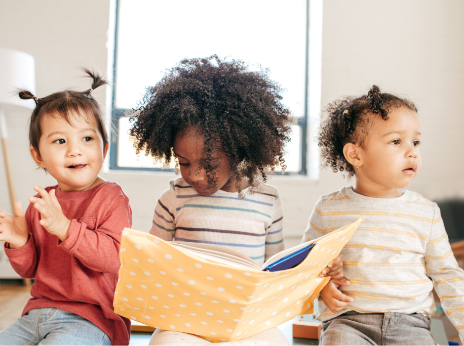 toddlers reading together