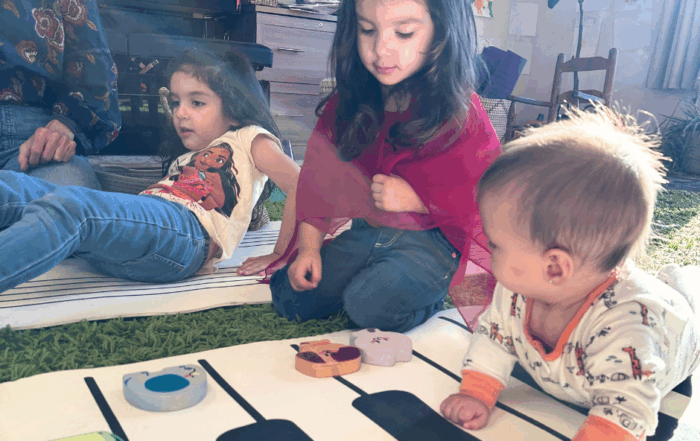 kids playing on piano mat