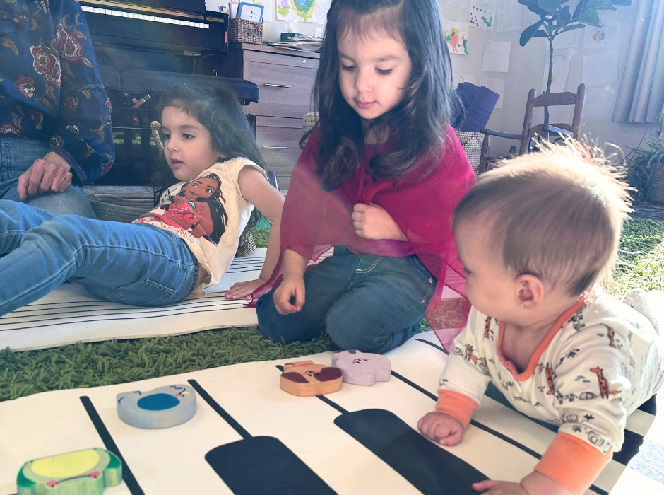 kids playing on piano mat