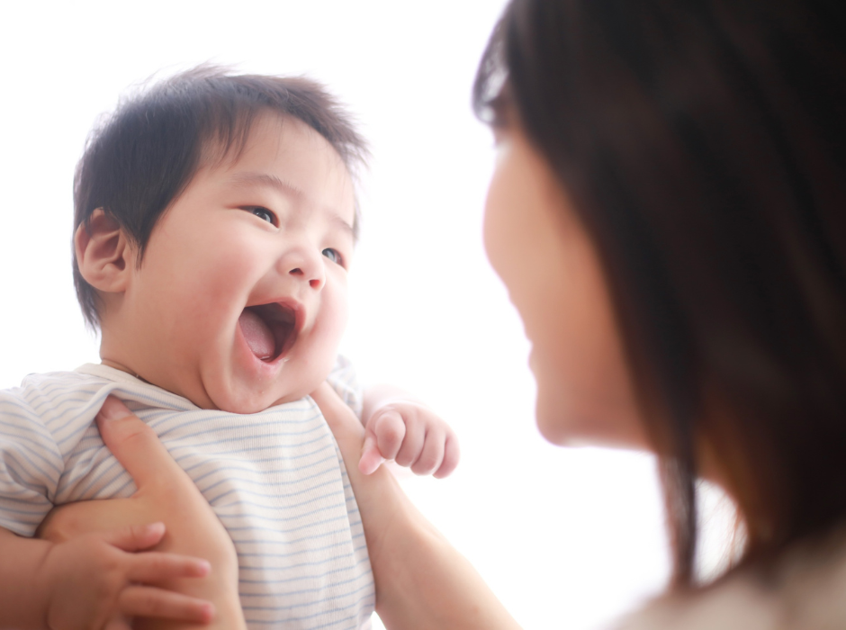 parent signing with baby