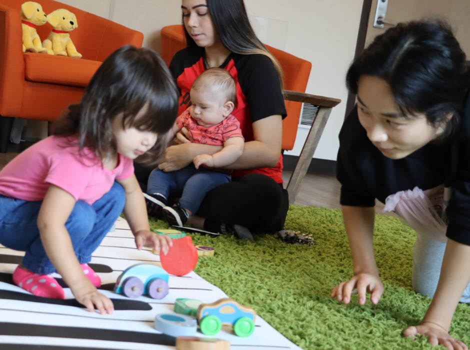 toddler playing on piano mat