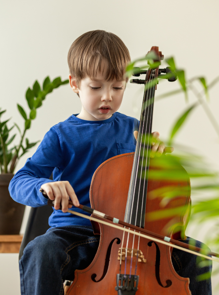 mom and toddler playing piano