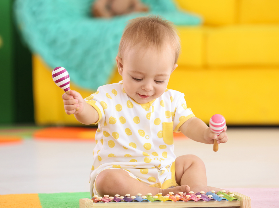 baby playing xylophone